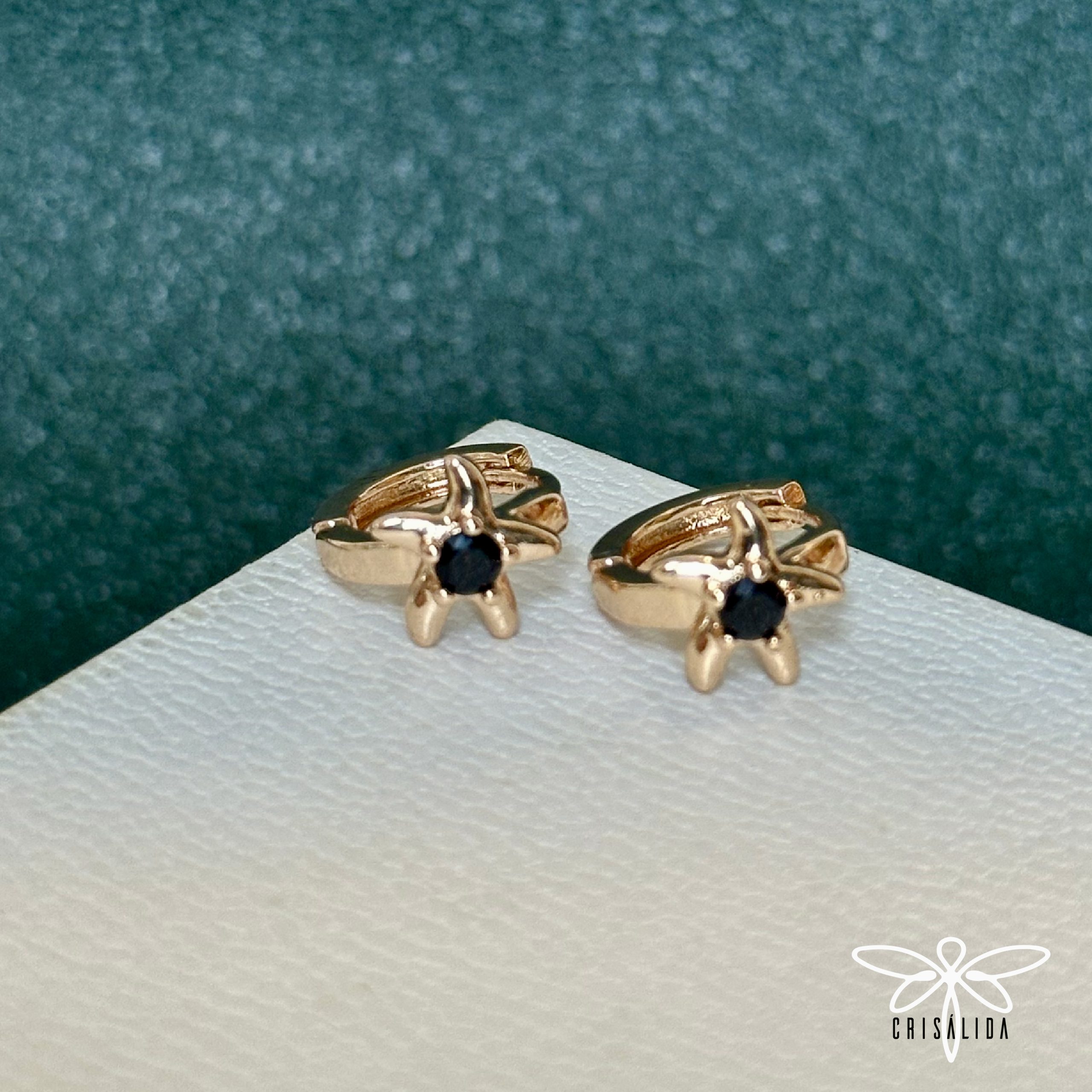 Argollas de estrellas de mar con piedra negra