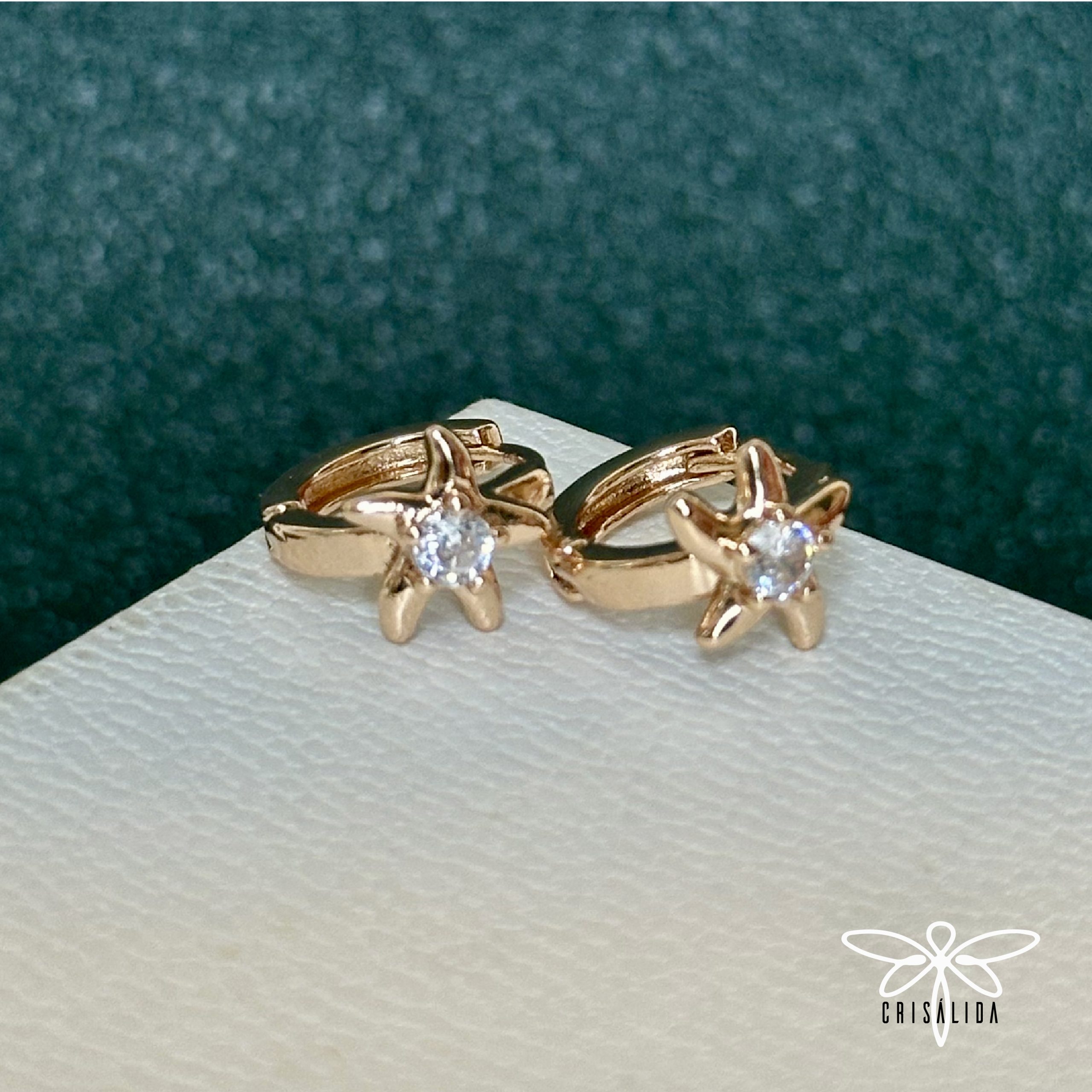 Argollas de estrellas de mar con piedra cristal