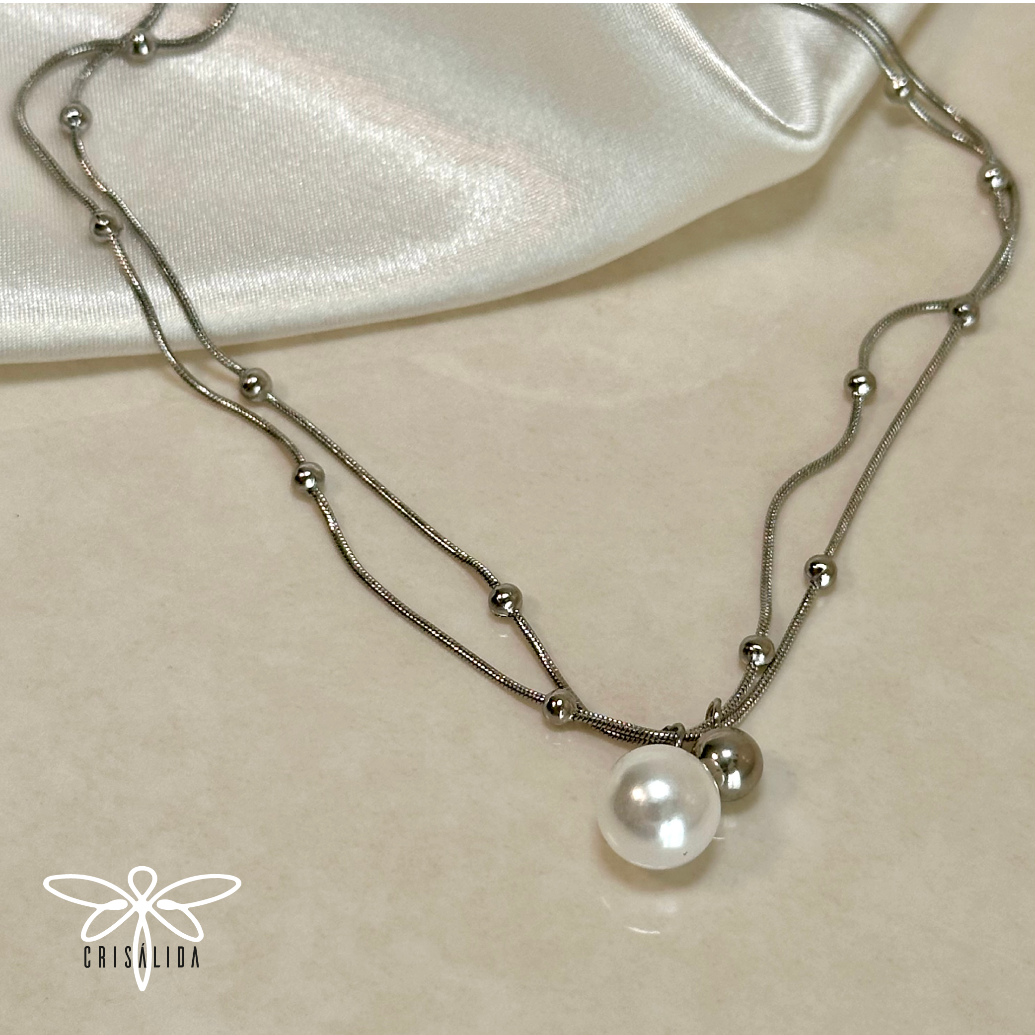 Collar doble con bolitas y perla