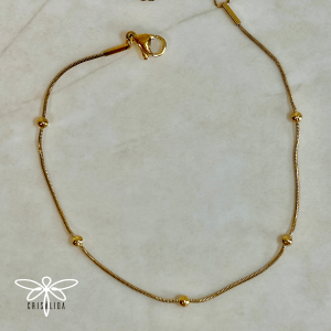 Manilla simple con bolitas