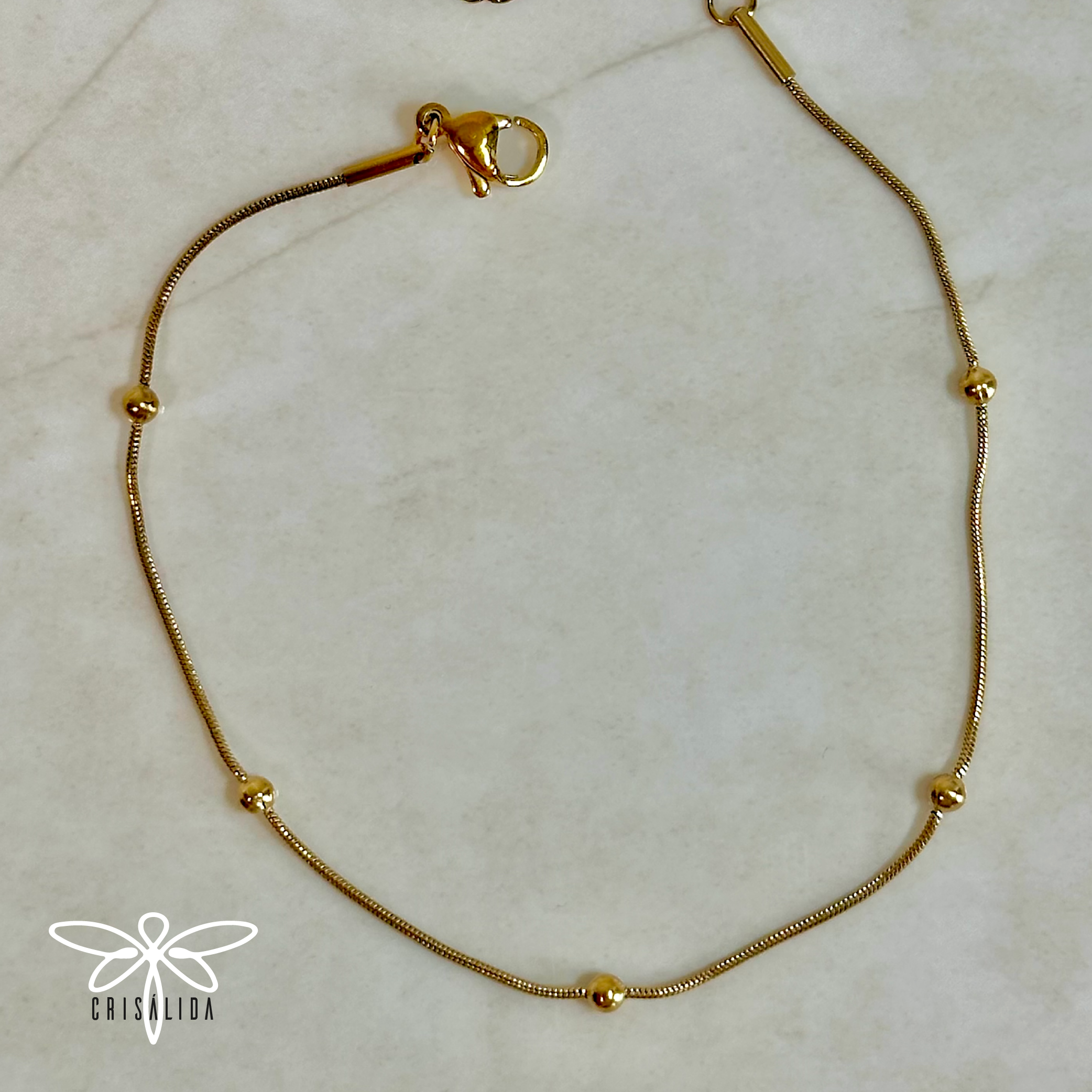 Manilla simple con bolitas