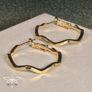 Argollas doradas grandes zig zag